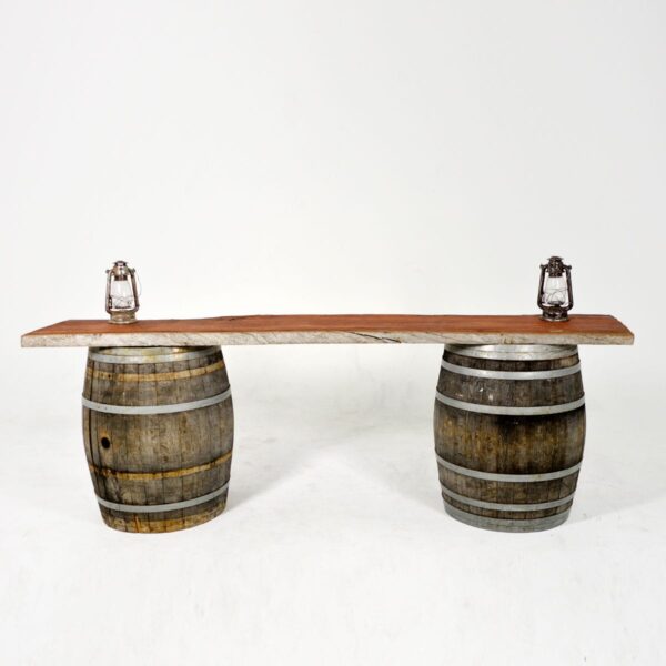 Raw Timber Table Top on Two Barrels - Sydney Prop Specialists - Prop Hire and Event Theming