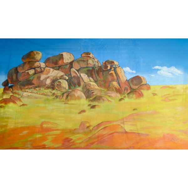 Depicts a outcrop of rocks in an arid region of Australia
